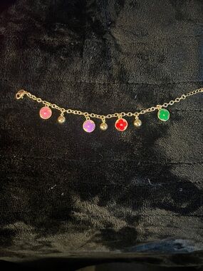 Gold-tone Flower Charm Bracelet with Pink, Purple, Red, and Green Enamel